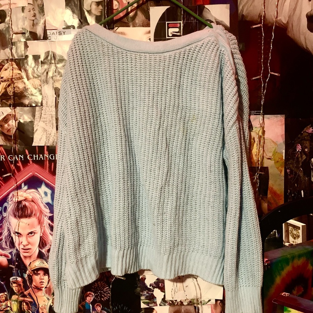 baby blue wooly sweater , size extra large but fits big